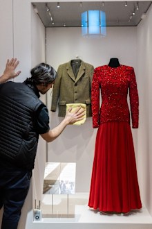 Items from the new exhibition Dress Codes at Kensington Palace, containing items of clothing worn by the royals including Elizabeth II, Diana Princess of Wales and Princess Margaret.