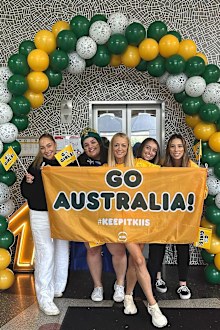 Jackie O posed with a banner for the Aussie side