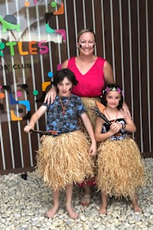Kids club grass skirt cultural lessons