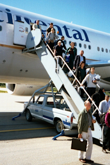 September 11, 2001: Nick Marson took this photo of the passengers finally disembarking Continental 5 in Gander, Canada.