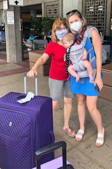 Woman and baby reunited with family at airport
