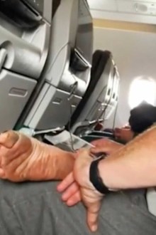Passenger Shaming viral video: man picks at dirty foot with pinky
