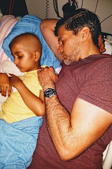 Getting some much-needed rest with her dad by her side.