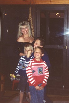 'Cheeky' Dan ruining yet another family photo.