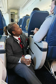 flight attendant goes viral for comforting nervous woman on flight to JFK