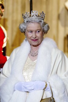 Queen Elizabeth II Smiling As She Arrives At The Palace Of Westminster For The State Opening Of Parliament. 