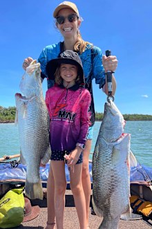 Emma Jeppesen and her daughter Zoey enjoy the spoils of a good day's fishing.