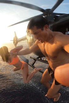 Katy Perry and Orlando Bloom jumping out of helicopter