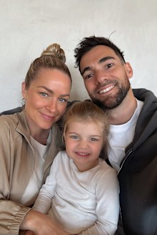 Renae Ayris with Andrew Papadopoulos and their daughter Harper