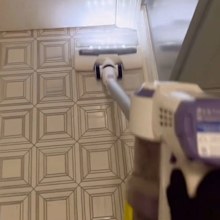 Cleaner Kellsie Zapata cleaning the bathroom, vacuuming the floor