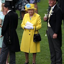 The Queen was resplendent in a yellow Angela Kelly ensemble. Picture: Getty