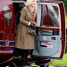 Camilla, Duchess of Cornwall, disembarking a Sikorsky Helicopter (The Queen's Helicopter Flight) in 2014. 