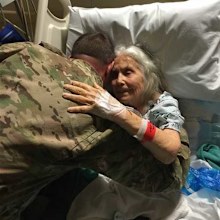 Elizabeth Laird shares a hug with a soldier. (Image: TODAY US)