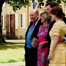 Eugenie pictured with her in laws and husband Jack.