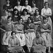 The photo is described as "some happy Ulster girls from a linen factory of North Ireland's chief city."