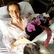 Emma Watkins in hospital after surgery to manage her endometriosis in 2018.