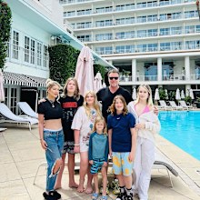 Spelling quelled rumours with a pool-side family picture.