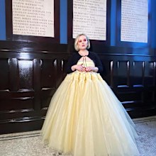 Nicola Coughlan wore a yellow gown with a black cardigan for the Golden Globes.