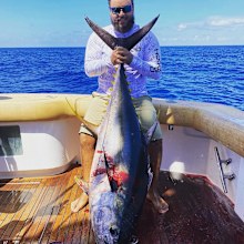 Connor Cruise, 26, shared a rare photo of him on a fishing trip.