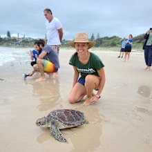 Dr Jo Day releasing a Green Sea Turtle.