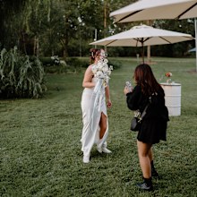 Kristine Sattore working as a wedding content creator.