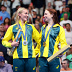 Gold Medalist Mollie O'Callaghan (R) and Silver Medalist Ariarne Titmus of Team Australia (L) celebrate on the podium during the Swimming medal ceremony after the Women's 200m Freestyle Final