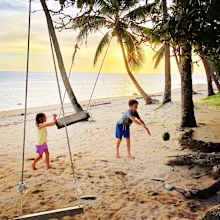 Kids playing on a tropical beach