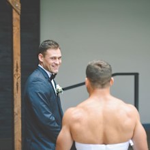Bride pranks groom with best man wearing a wedding dress