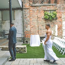 Bride pranks groom with best man wearing a wedding dress