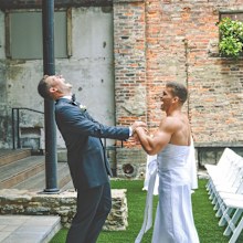 Bride pranks groom with best man wearing a wedding dress