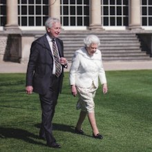 Hugo Vickers with Her Majesty, The Queen at a Buckingham Palace garden in 2018 