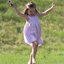 Princess Charlotte frolicks at the polo, 2019