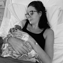 Jade Redmond holds her first child, Harper.