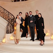 Victoria Beckham poses with her family including David Harper Cruz and Romeo in Paris
