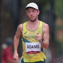 Liam Adams running at the Tokyo Olympics in 2021.