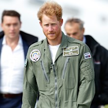 Prince Harry watches Spitfires take off on the airfield at Goodwood Aerodrome during a Battle of Britain Flypast at Goodwood on September 15, 2015 in Chichester, England. 
