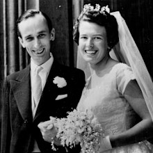 Archbishop's Son Weds Air Girl - Mr. Humphrey Fisher, 35, Fourth son of the Archbishop of Canterbury Dr. Geoffrey Fisher, and Boac air Stewardess Diana Davis, 27, after their wedding at the chapel of Lambeth Palace traditional home of the Archbishop of Canterbury today Diana will be transferred to the ground state of Boac now she has been marries. Her husband is a BBC TV producer, and the couple will have a "Flying Honeymoon". July 22, 1959.