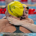 Mollie O'Callaghan, right, of Australia, is congratulated by teammate Ariarne Titmus after winning the women's 200-meter freestyle final at the 2024 Summer Olympics, Monday, July 29, 2024, in Nanterre, France. (AP Photo/Bernat Armangue)