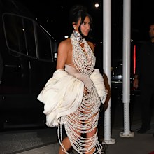 Kim Kardashian after the 2023 Met Gala with broken pearl strands on her dress.