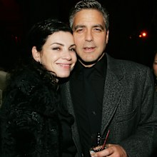 Actor George Clooney and his former co-star Julianna Margulies attend the Syriana premiere after party at The New York Public Library November 20, 2005 in New York City. 