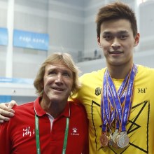 Denis Cotterell (left) and Sun Yang in 2017.
