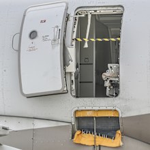 An emergency exit door of an Asiana Airlines plane is seen at Daegu International Airport in Daegu, South Korea, Friday, May 26, 2023, after a passenger opened it during a flight.