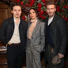 Brooklyn Beckham, Victoria Beckham and David Beckham at the Kent & Curwen presentation during London Fashion Week Men's January 2019 at Two Temple Place on January 6, 2019 in London, England.