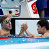 Zhanle Pan of Team People's Republic of China celebrates with Kyle Chalmers of Team Australia after winning gold and silver in the Men's 100m Freestyle Final on day five of the Olympic Games Paris 2024 at Paris La Defense Arena on July 31, 2024 in Nanterre, France. (Photo by Quinn Rooney/Getty Images)