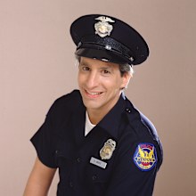 Charles Levin (as police officer Elliot Novak) in the TV show Alice