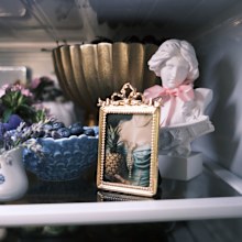 Busts, picture frames and ornate bowls dotted Judish's fridge for her Bridgerton — or "Fridgerton" — theme. 