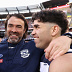 Patrick Dangerfield, Chris Scott and Tyson Stengle celebrate Geelong's 2022 grand final win.