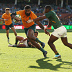 Marika Koroibete of the Wallabies makes a break to score a try.