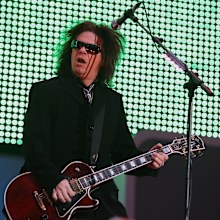 Andy Taylor of Duran Duran performs in concert after the Medal Ceremony at the Medals Plaza on Day 5 of the Turin 2006 Winter Olympic Games, February 15, 2006 in Turin, Italy.