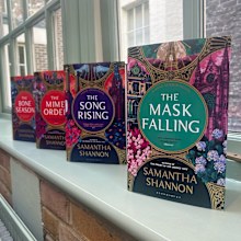 Revised copies of The Bone Season and its three sequels.